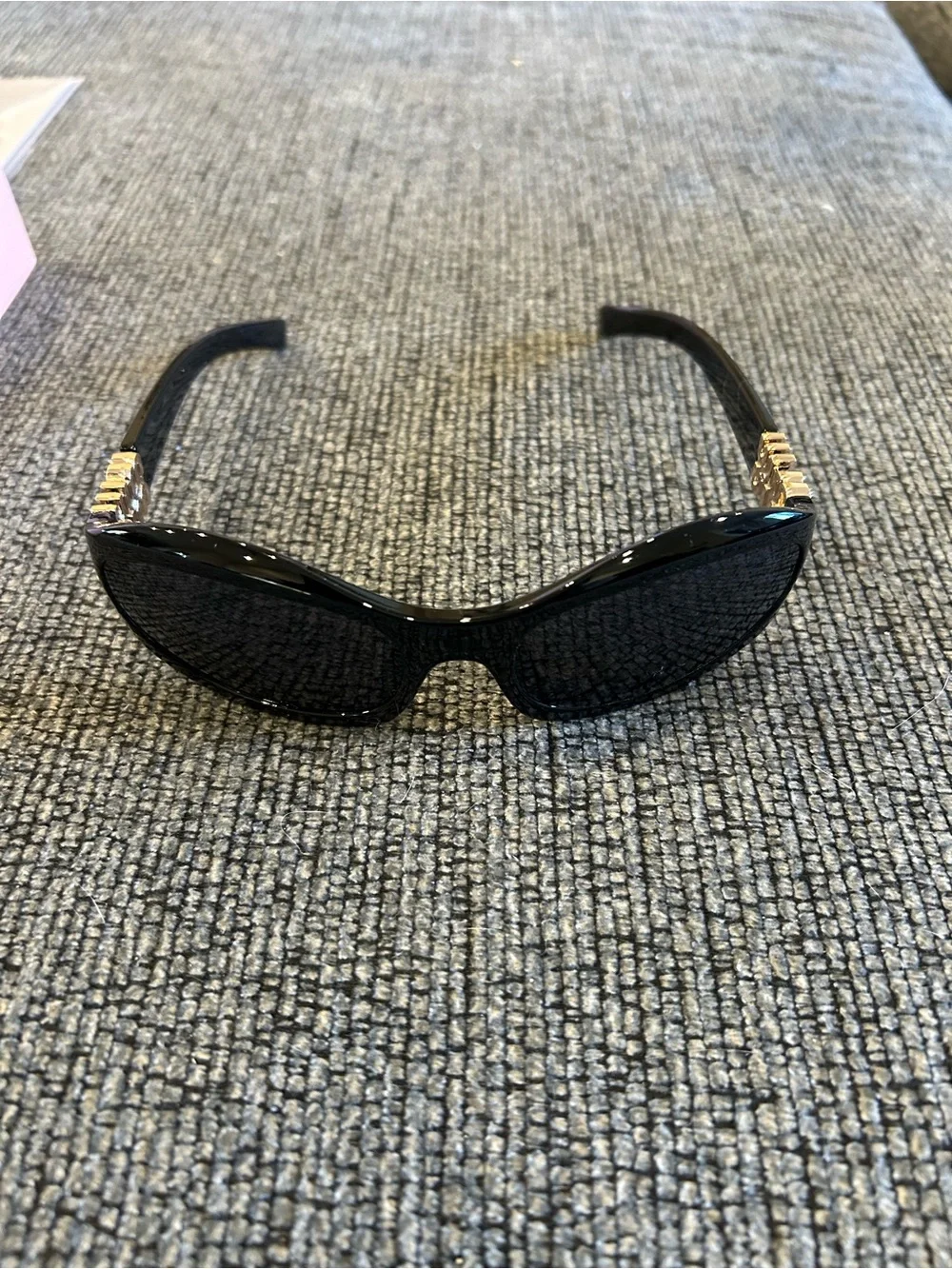 Miu Miu Black Sunglasses with Gold Temple Accents